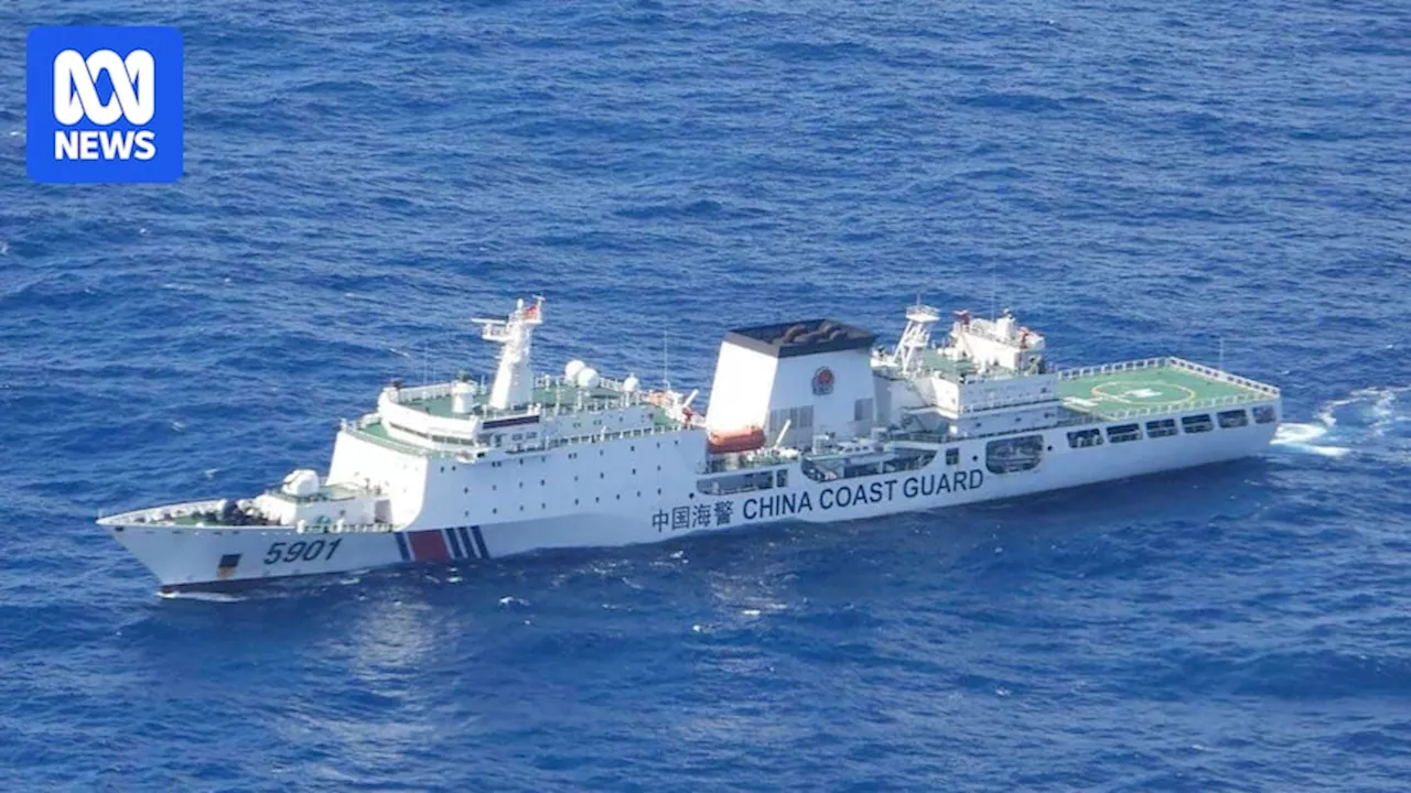 Philippines threatens legal action after Chinese coast guard ship sails in disputed South China Sea