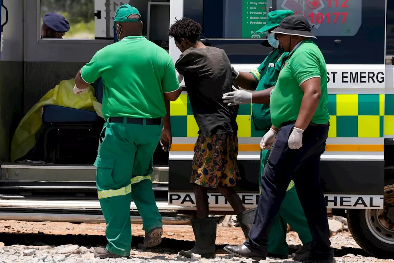 Rescuers bring out survivors, dead from South African mine as hundreds remain underground