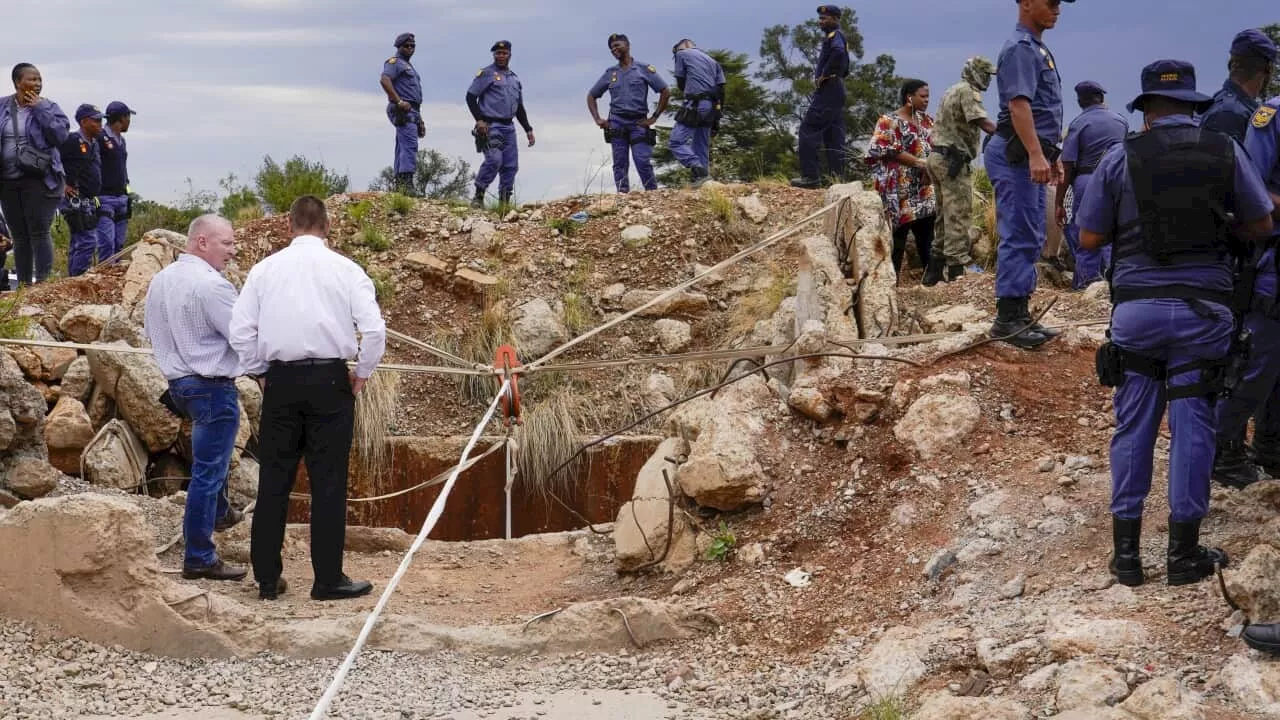 Scores of trapped miners die of starvation in illegal South African mine, union says