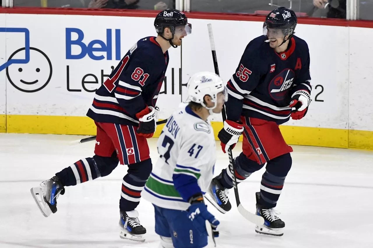 Connor's Hat Trick Powers Jets to 6-1 Win Over Canucks