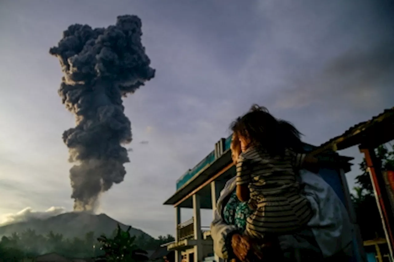 Mount Ibu erupts in eastern Indonesia, forcing mass evacuation of villagers