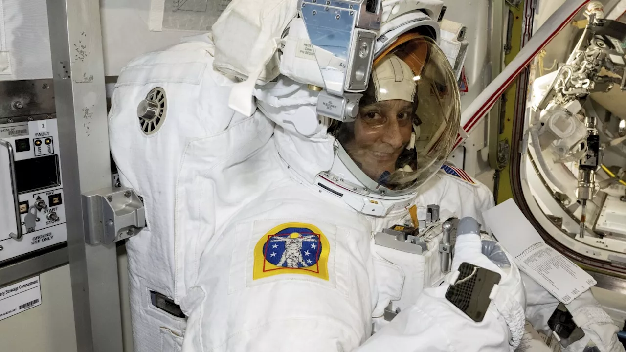 NASA's stuck astronaut steps out on a spacewalk after 7 months in orbit