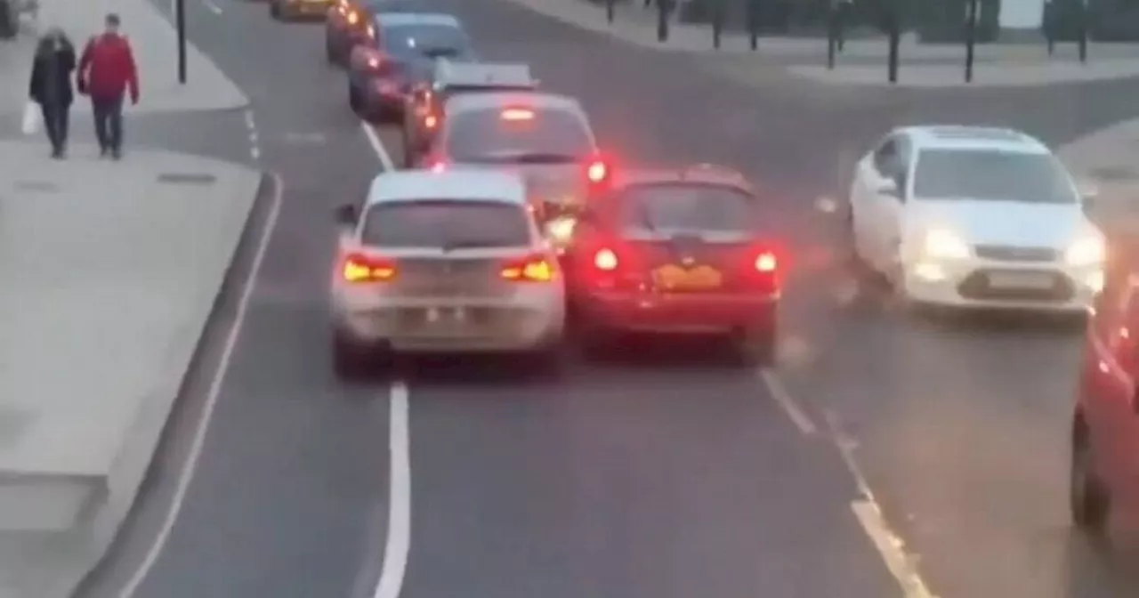 Road Rage in London: BMW Driver and Nissan Micra Engage in Frenzied Struggle for Car Length