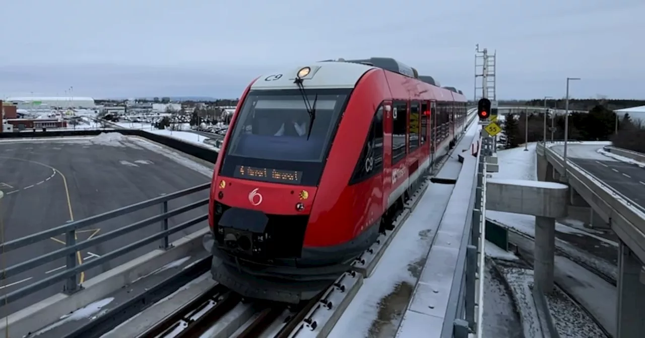 An Alstom LINT train arrives at Airport Station at the Ottawa International Airport on Monday