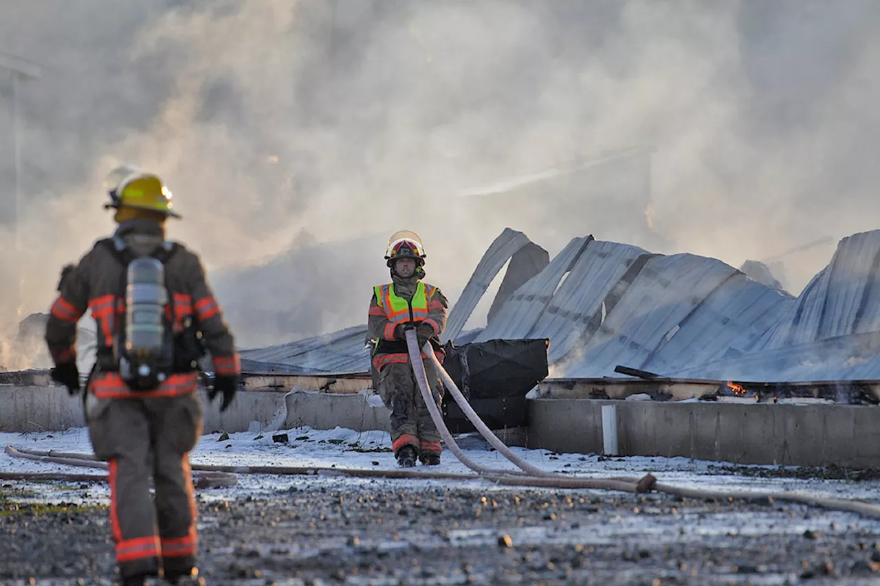 VIDEO: Chilliwack firefighters battle pair of burning poultry barns