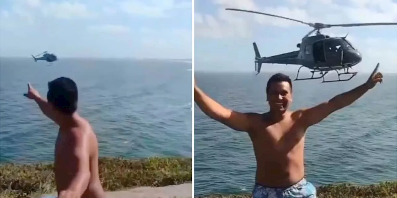 Student macht Selfies am Strand - dann taucht Militärhubschrauber hinter ihm auf