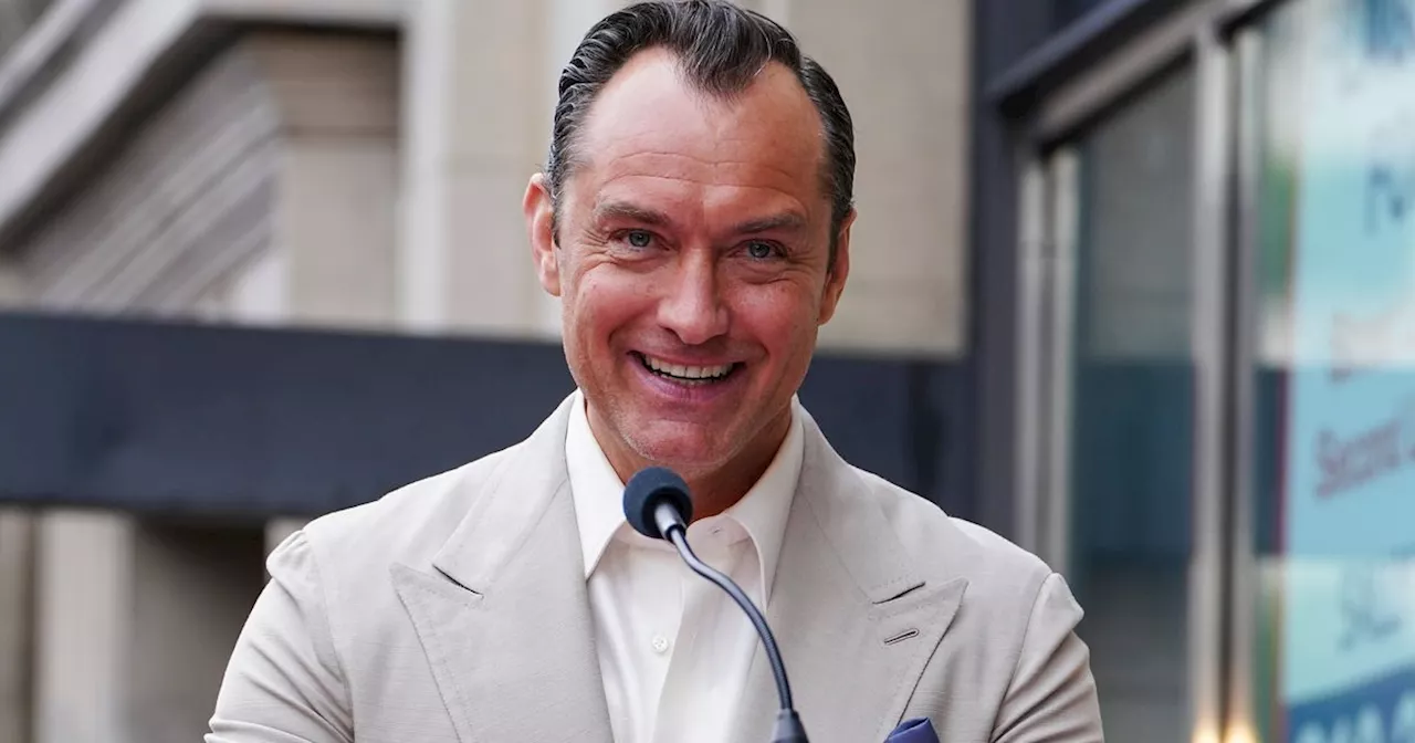 Jude Law Vows to 'Defend' His Signature Hairstyle