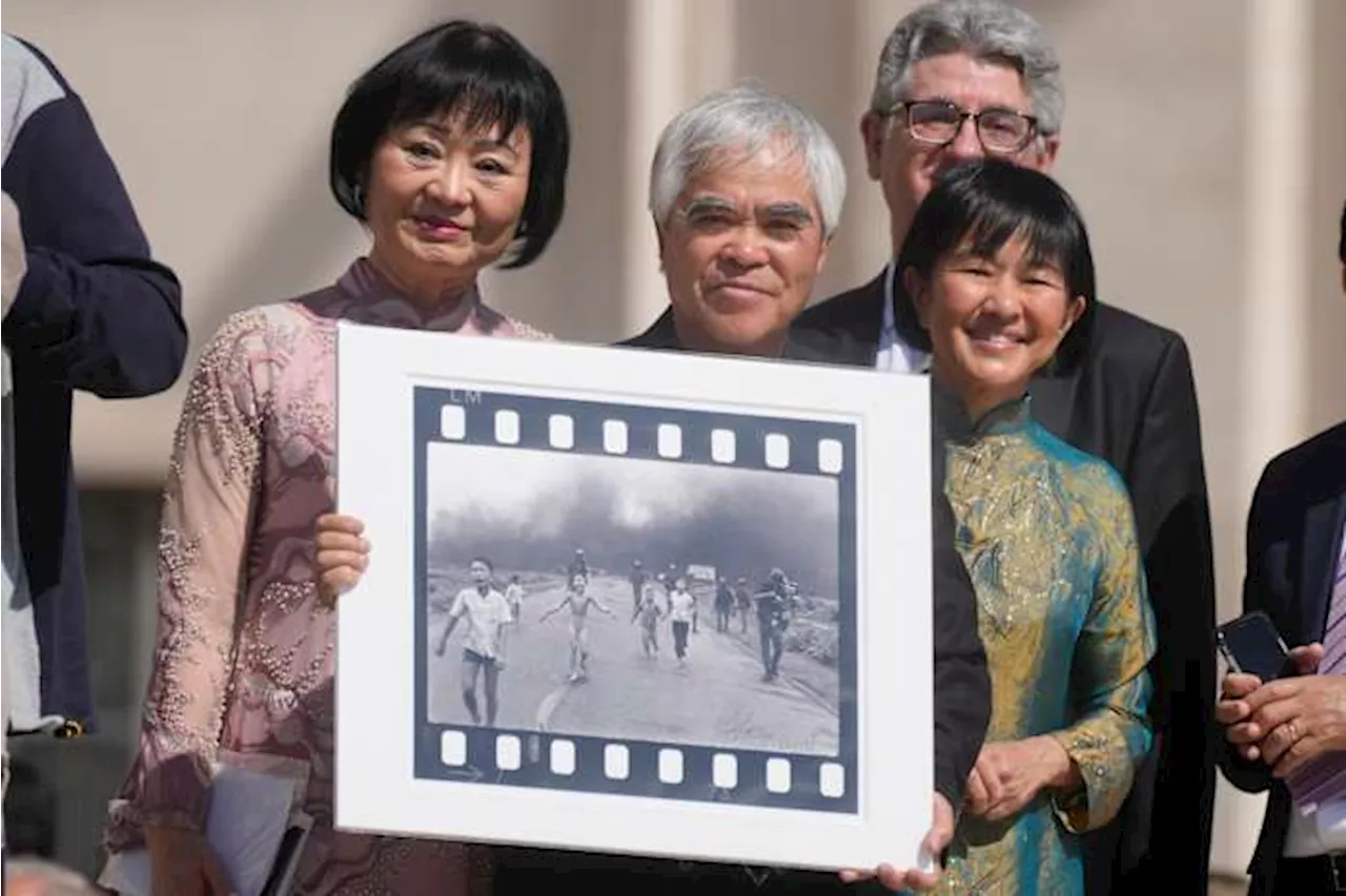 He is credited with one of history's most indelible photos. A new documentary questions who took it