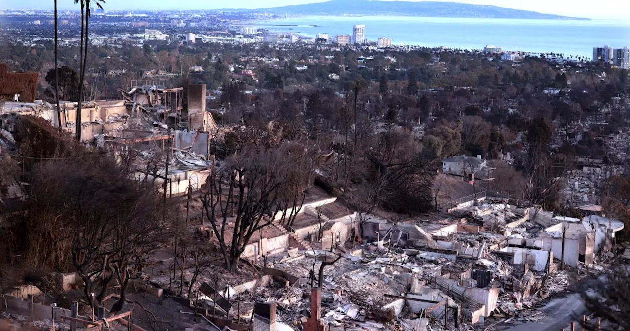 Live L.A. fire updates: Crews improve containment on Palisades, Eaton fires as winds die down