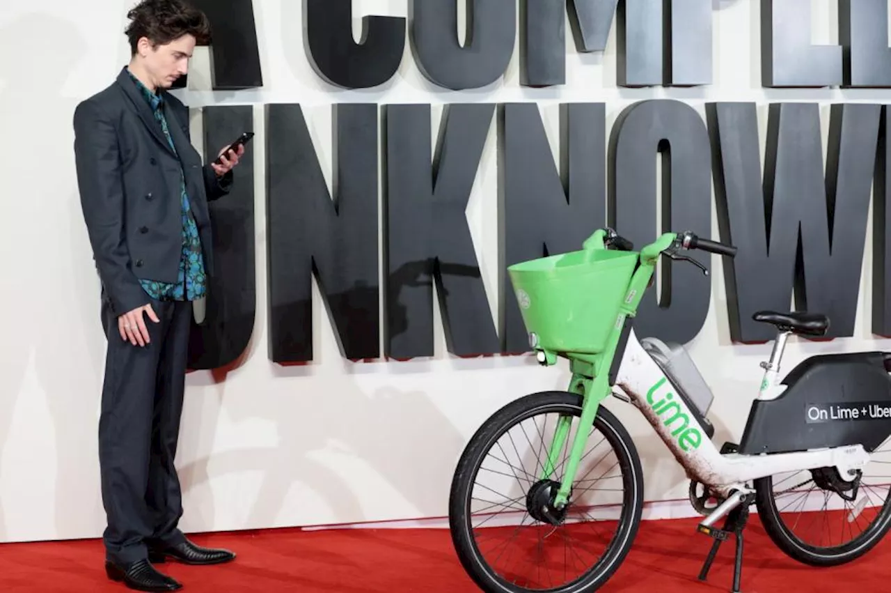 Dylan goes electric… and gets fined! Timothée Chalamet slapped with “£65 parking fine” after riding Lime bike to London premiere of A Complete Unknown