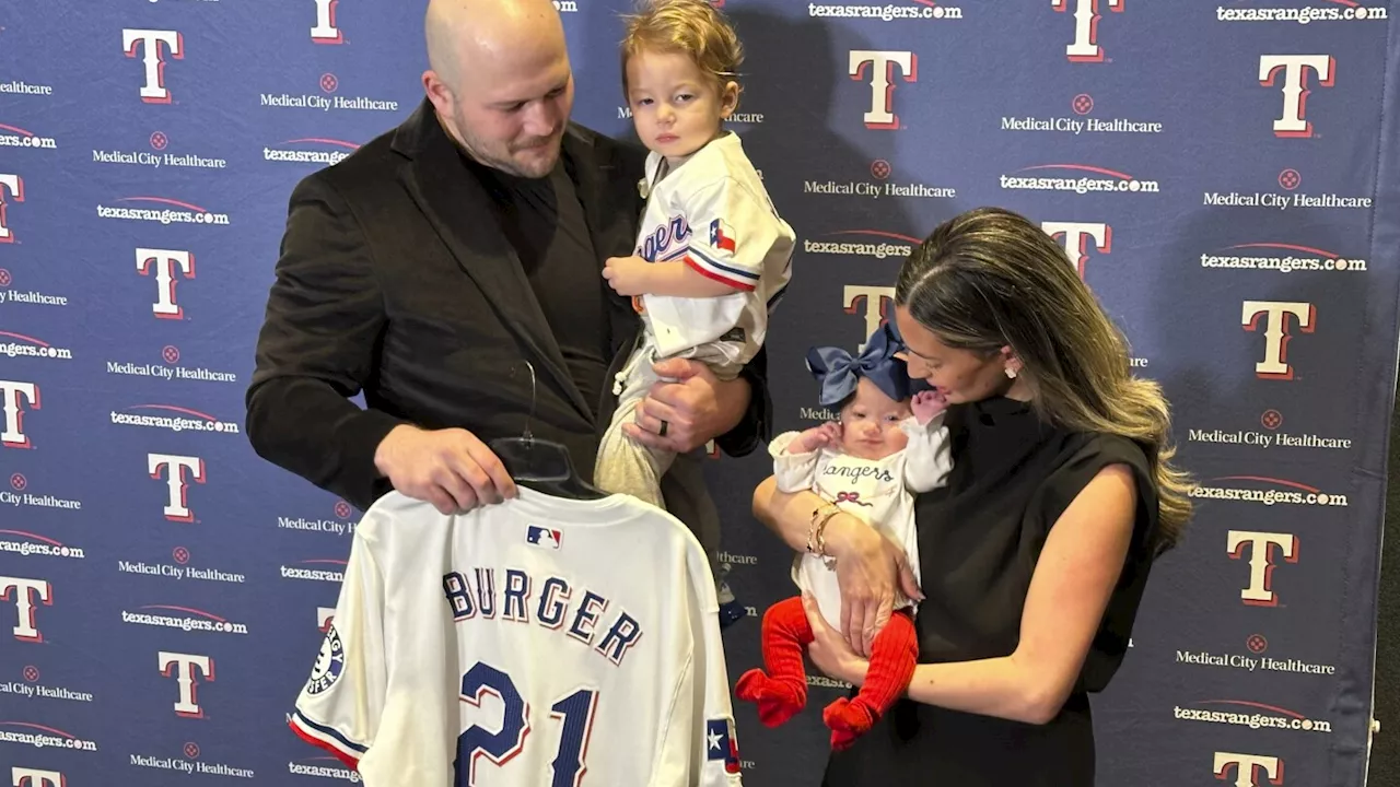 Jake Burger will wear No. 21 with the Texas Rangers for his daughter born with Down syndrome