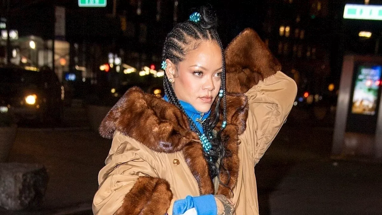 Rihanna bundles up in fur-lined coat as she sparks new music rumors with late-night studio visit in...