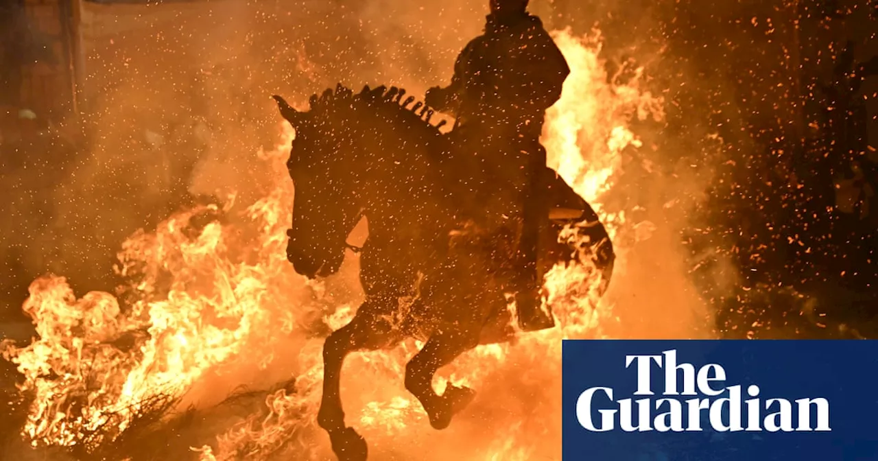 Riding through fire and a retiring Sumo grand champion- photos of the day: Friday