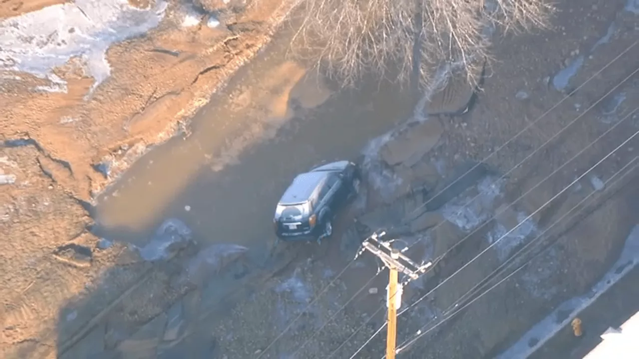 Sinkhole Engulfs SUV in New Jersey After Water Main Break