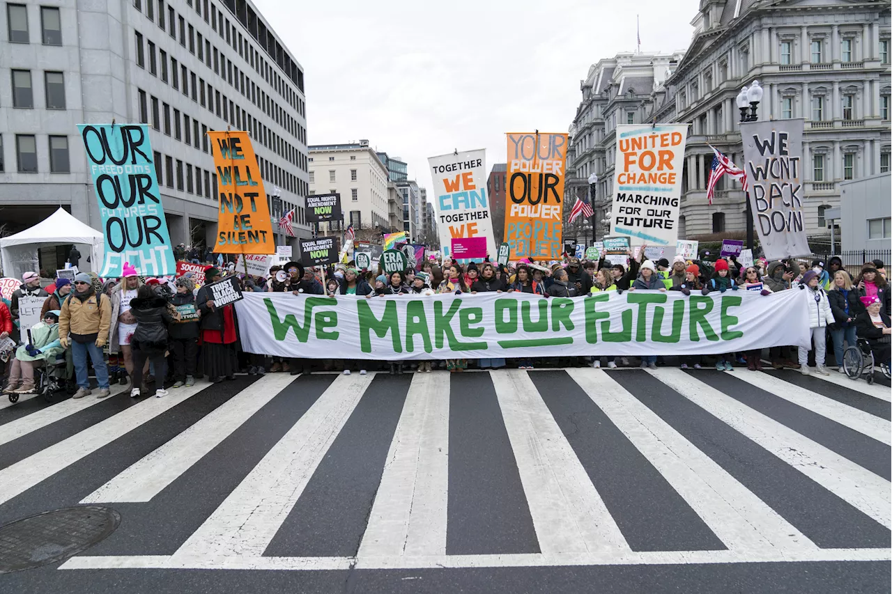 The People's March: Photos Show Large DC Protest Before Trump Inauguration