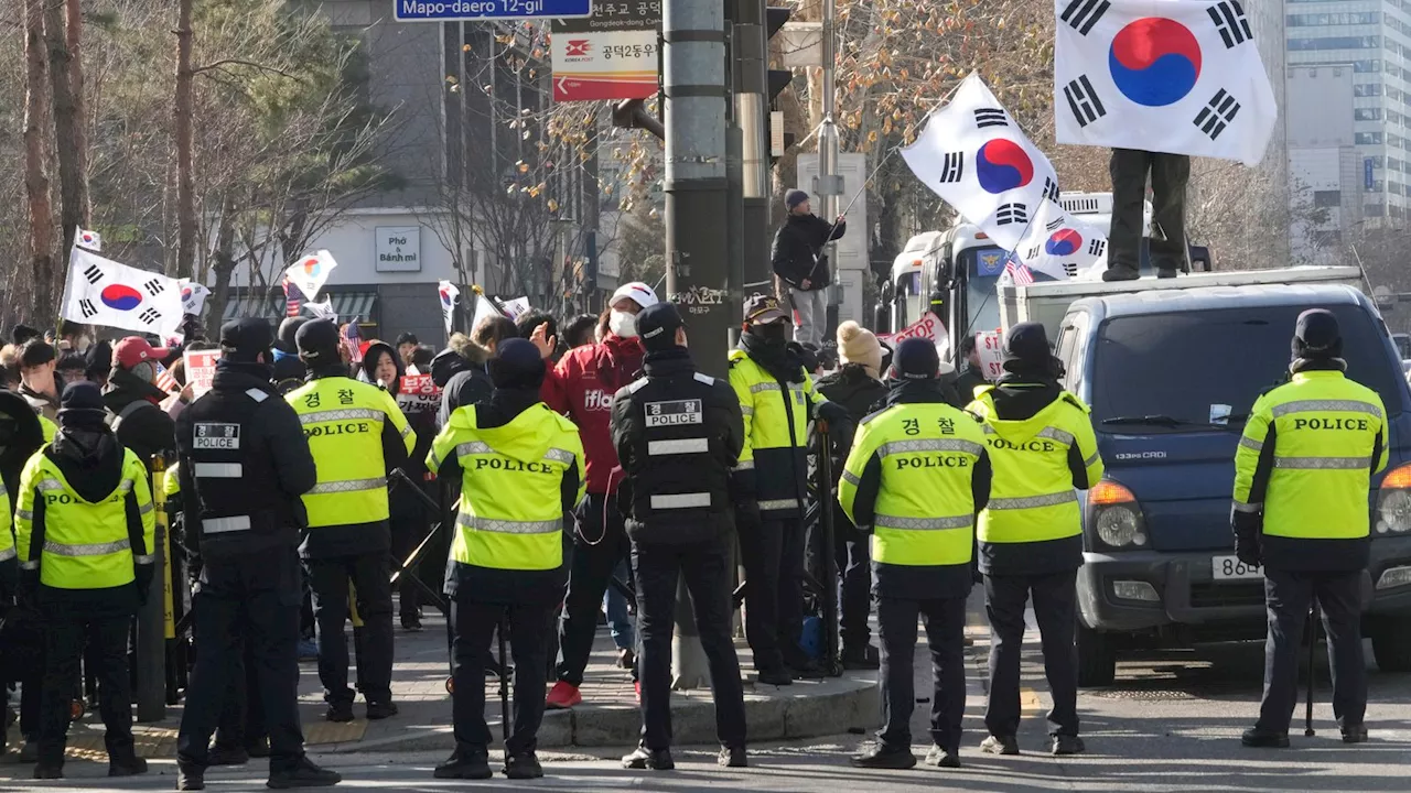 South Korea president to appear at hearing as thousands of supporters gather near court