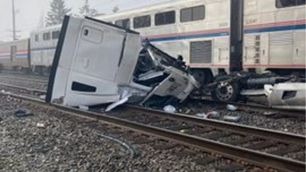 VIDEO: Amtrak train hits stuck semi-truck in Auburn; no injuries reported