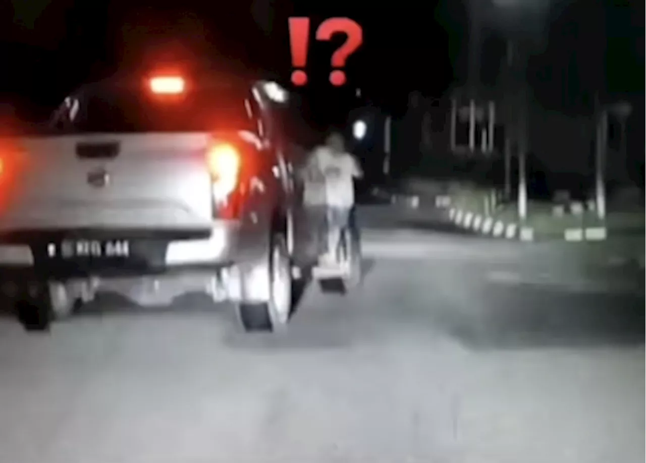 Nilai father detained after six-year-old’s ‘fun’ ride hanging from pickup truck goes viral
