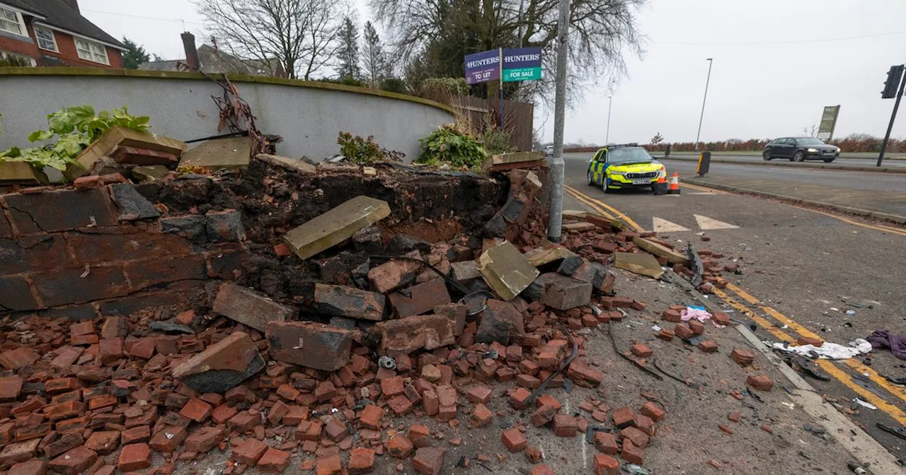 Man fighting for life after BMW 'mounts kerb and smashes into wall'