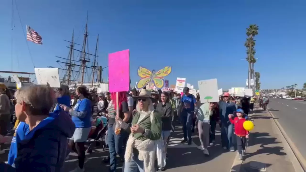 Hundreds attend the People's March at Waterfront Park in San Diego