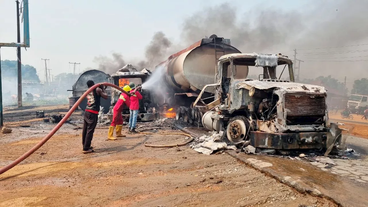 Fuel explosion kills 70 in Nigeria as crowd 'scooped fuel' from overturned tanker