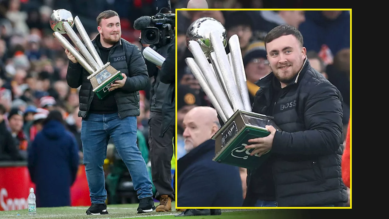 Luke Littler parades World Championship trophy at Old Trafford with darts star serenaded by Manchester...