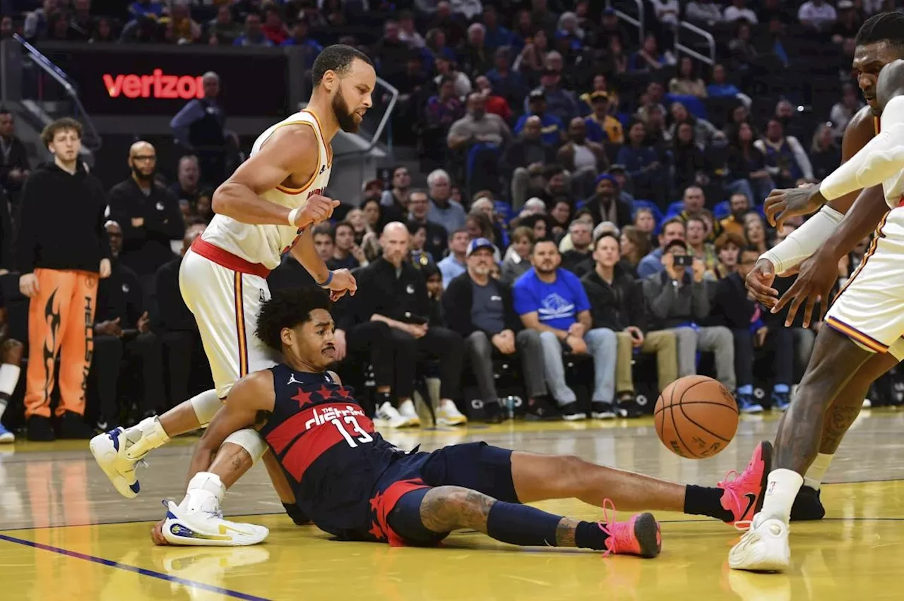 Stephen Curry scores 26 before leaving with ankle injury as Warriors beat Wizards 122-114