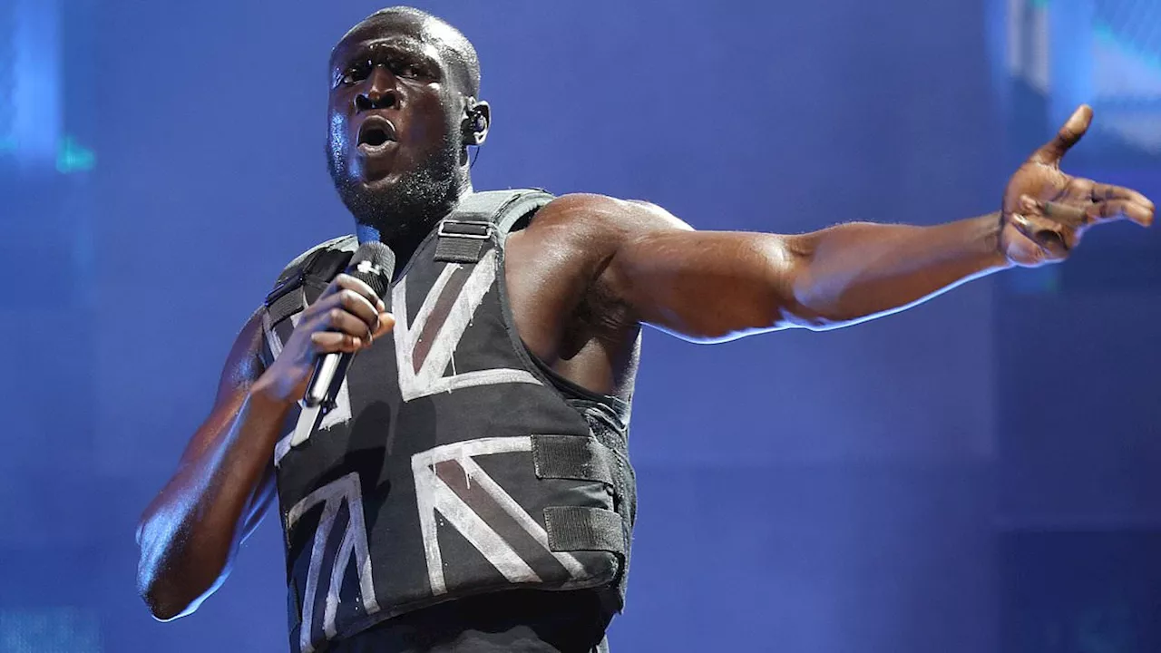 Stormzy is banned from driving for nine months after undercover police officer caught him using...