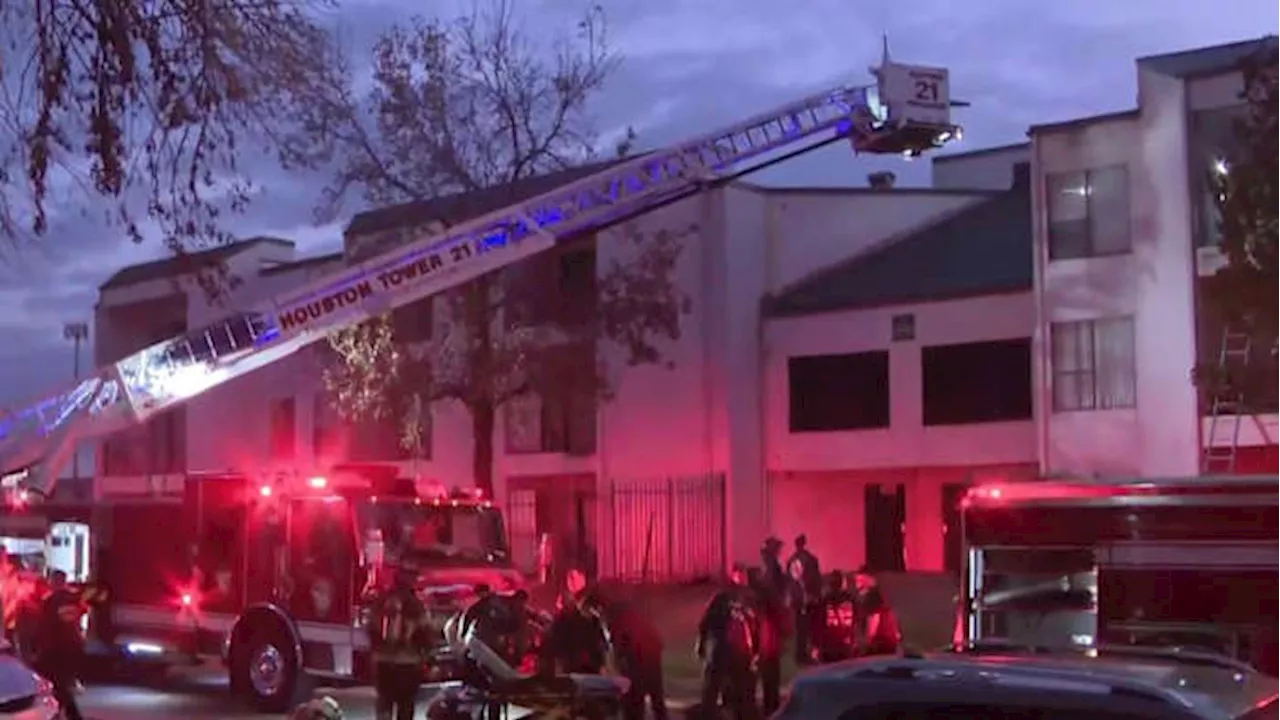 Firefighters battling large apartment fire in southwest Houston