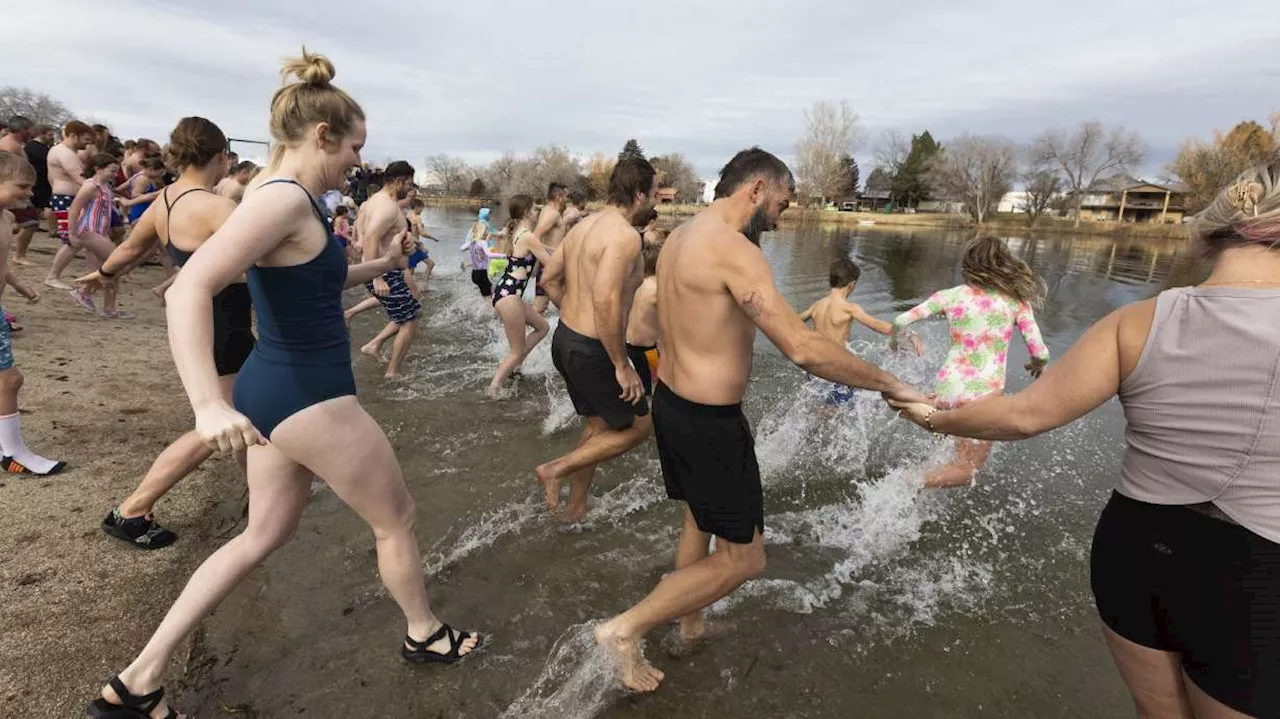 Father-Son Duo Embraces Chilly Challenge at Polar Plunge