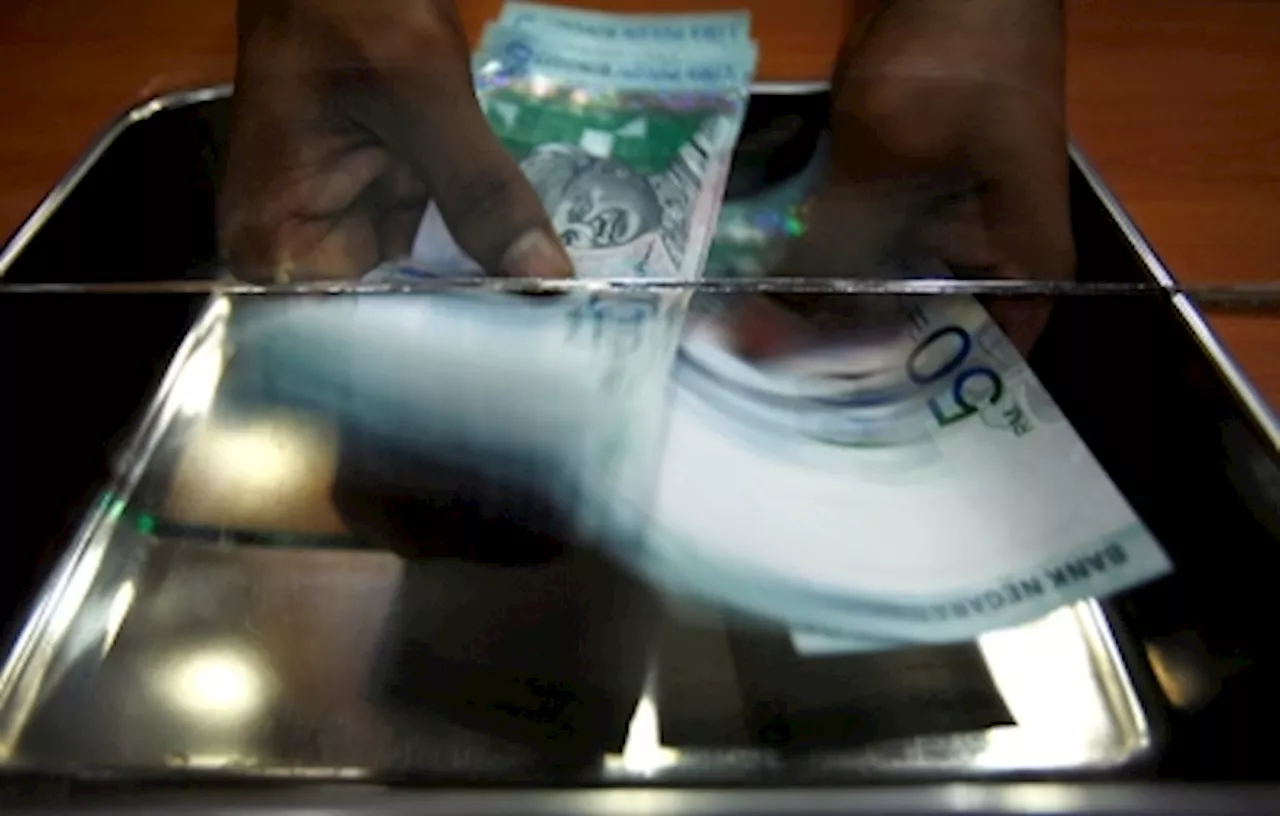 Ringgit Dips Against US Dollar Amid Fed Rate Concerns