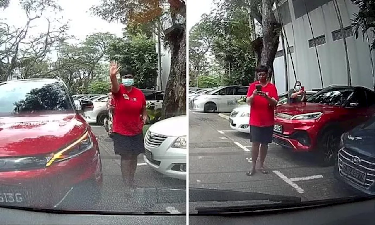 Woman stops motorist from reversing into lot for another car to park there: 'Masterclass in selfishness'