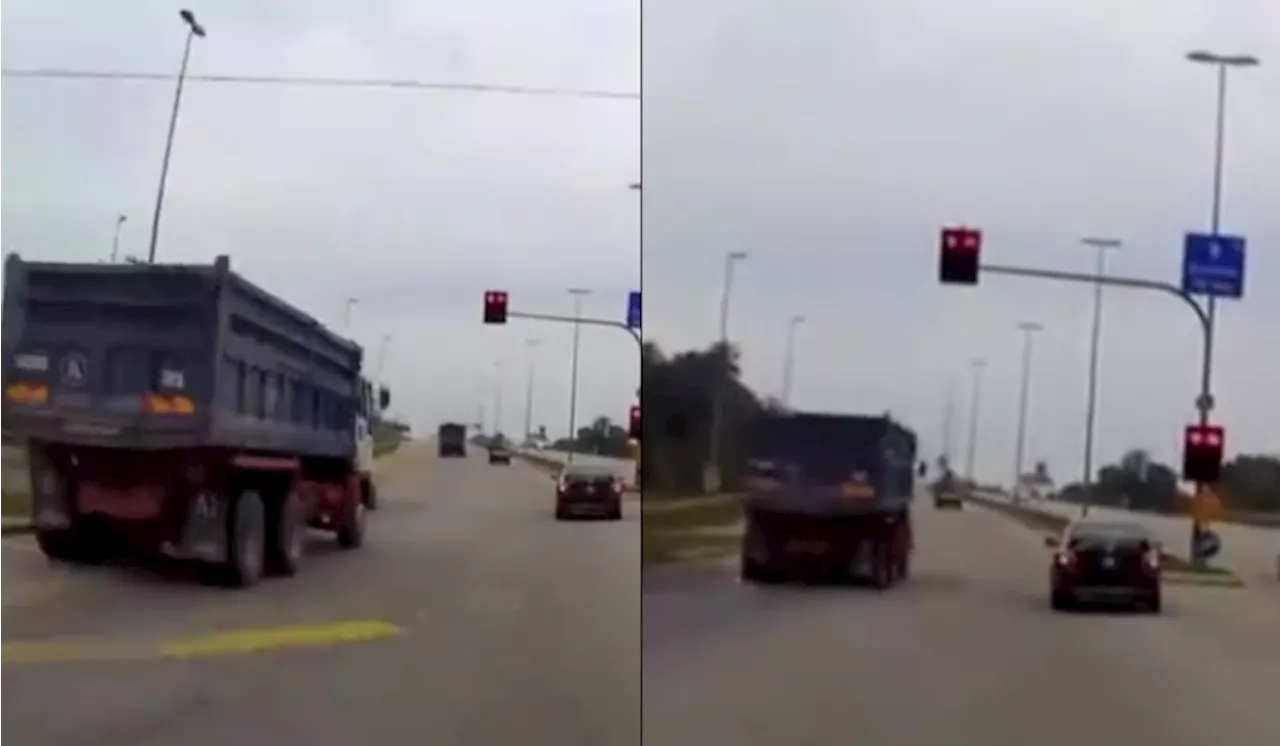 Dashcam Captures Truck and Car Ignoring Red Light