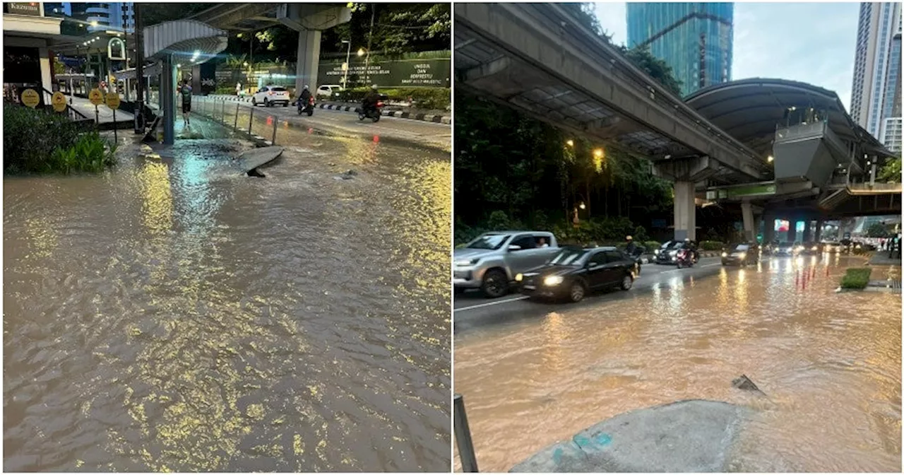 Flooded Road in Kuala Lumpur Causes Traffic Congestion Due to Burst Water Pipes