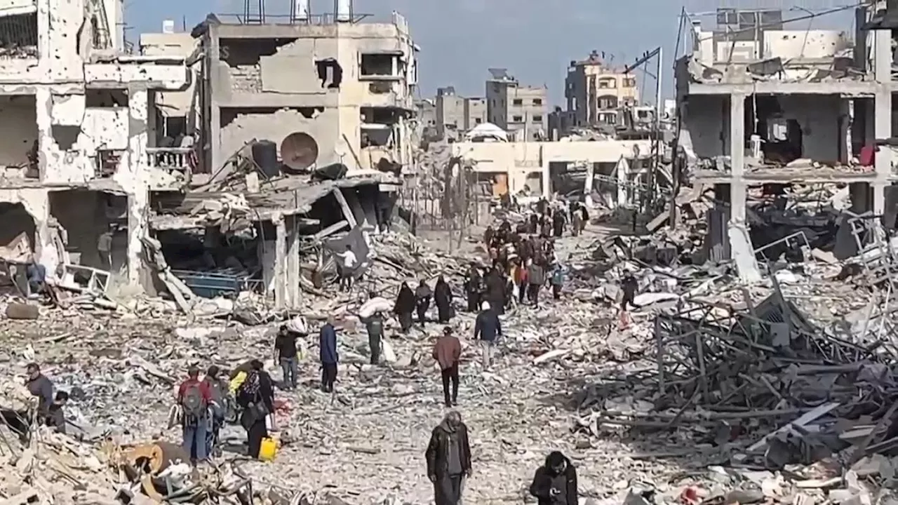 Residents returning to Jabaliya refugee camp in northern Gaza find their homes reduced to rubble