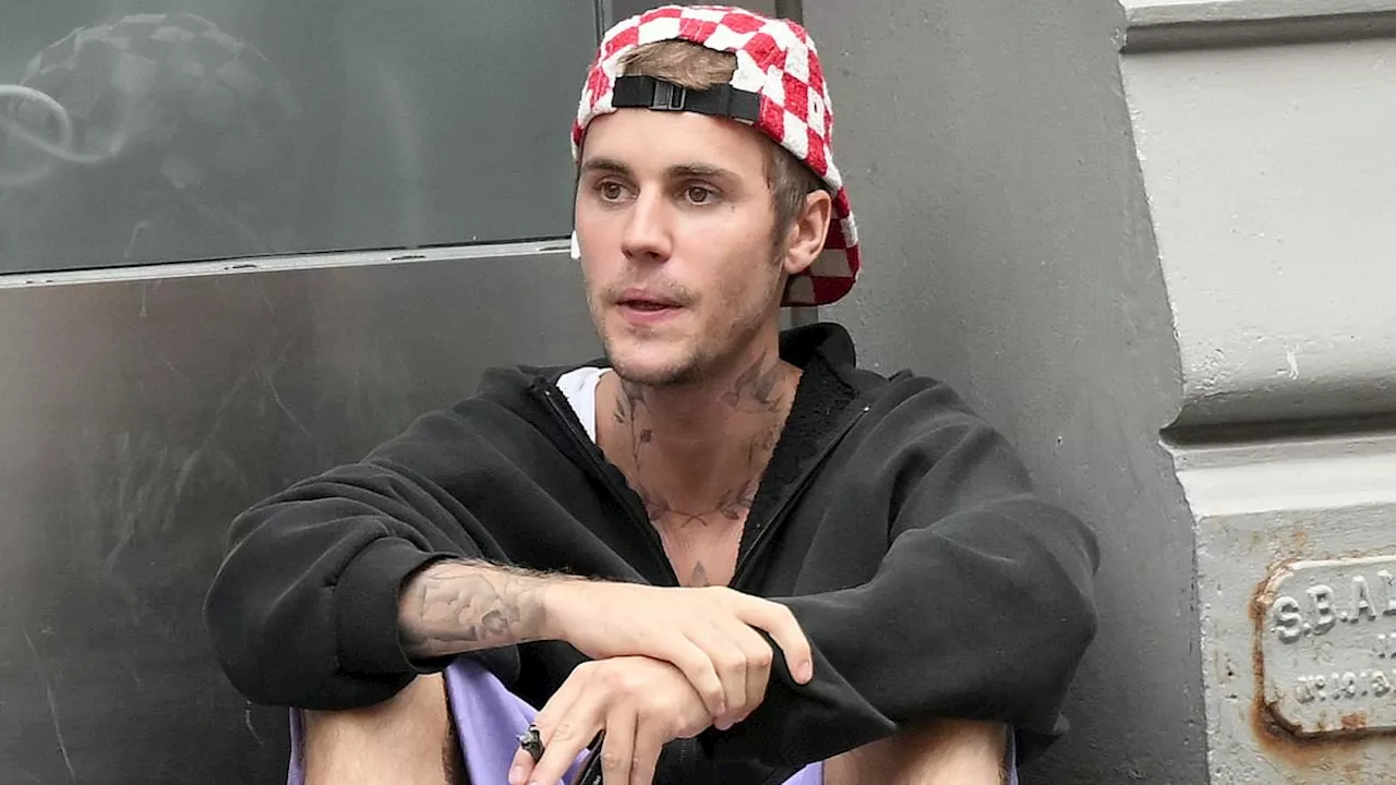 Justin Bieber appears to smoke marijuana as he takes a hit from a bong in Aspen amid fan concern