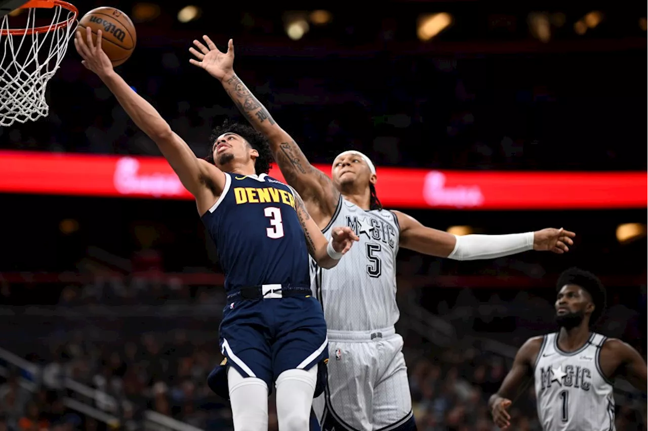 Christian Braun scores 20, Peyton Watson sustains head injury in Nuggets’ win at Magic