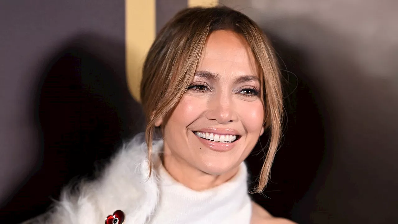 Jennifer Lopez's XL Chocolate Cherry Manicure Is the Most Elegant Nail Trend For Spring 2025