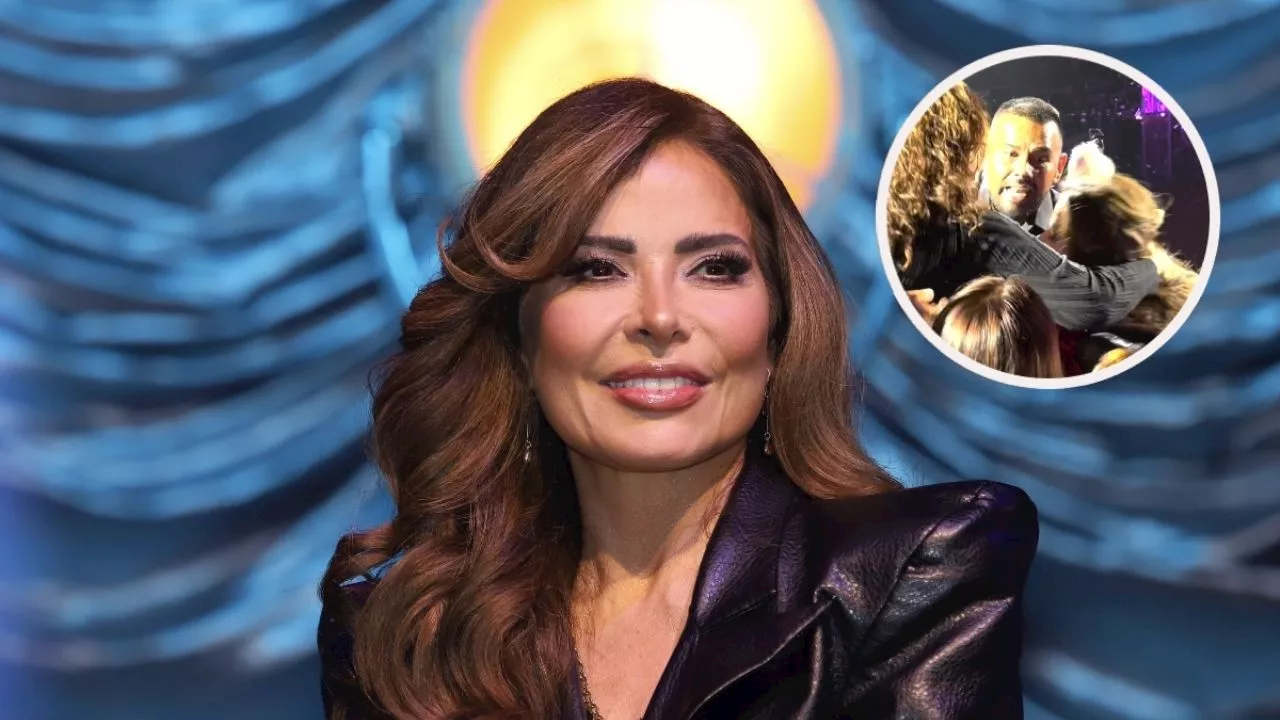 Gloria Trevi sufre incómodo momento al ser jaloneada por una fan en pleno concierto