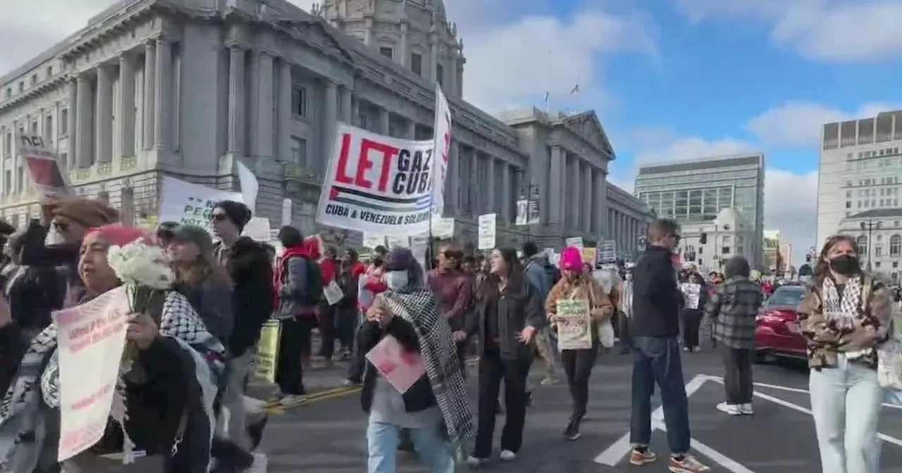 San Francisco demonstrators gather outside city hall voicing opposition to President-elect Trump