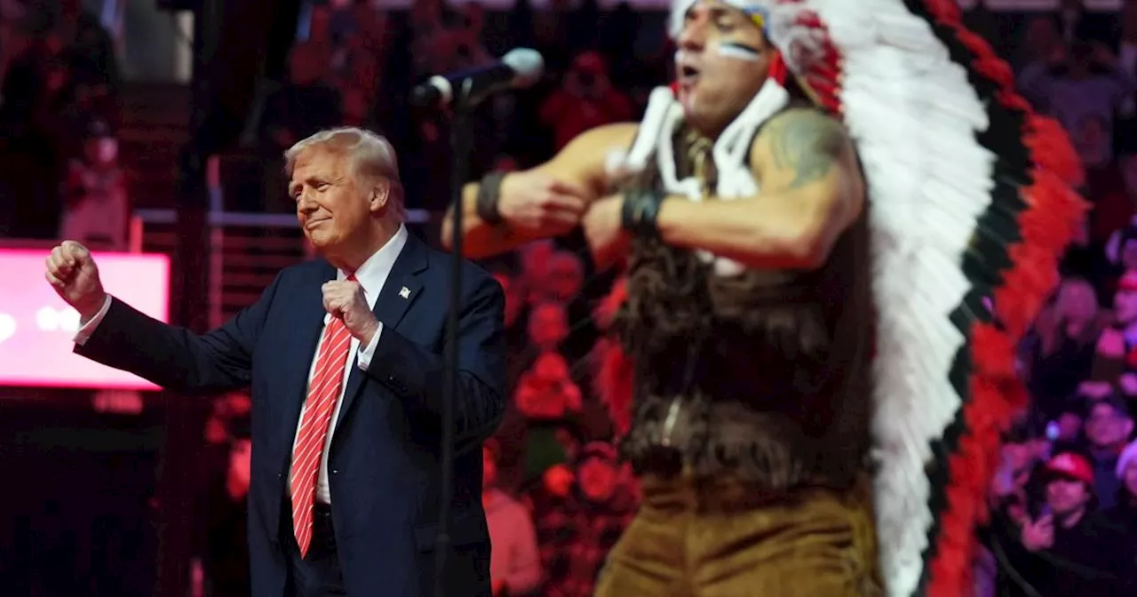 Donald Trump shows off dance moves with Village People during YMCA