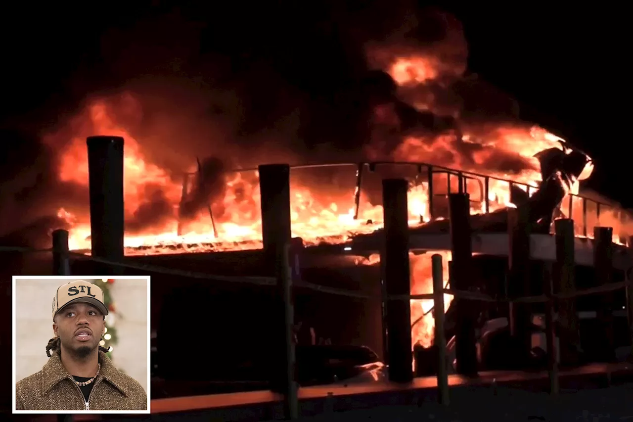 Massive yacht rented by legendary hip-hop producer bursts into flames outside popular Miami strip club