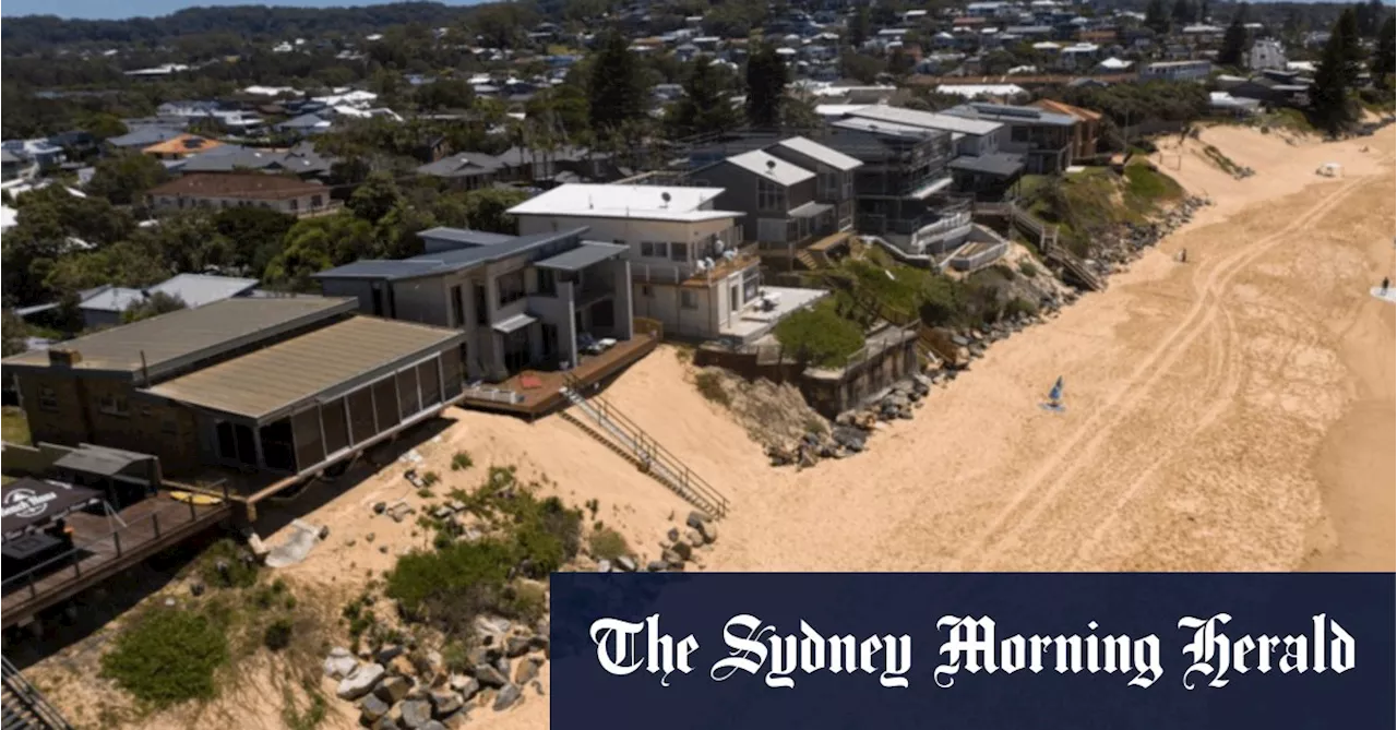 These houses were sinking into the ocean. Now a council wants to fix it