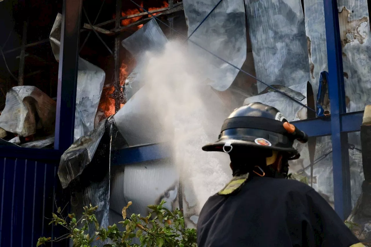 Flames destroy QC cold storage facility