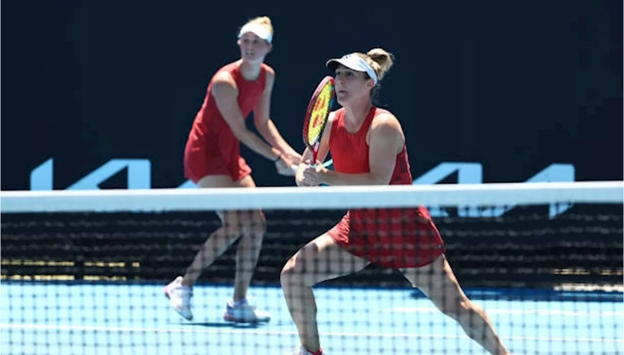 Dabrowski advances, Fernandez bounced from doubles at Australian Open