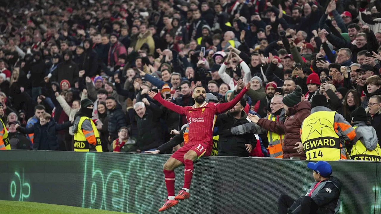 Liverpool beats Lille to reach Champions League round of 16. Barcelona wins 9-goal thriller