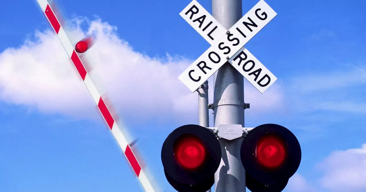 Woman Escapes Injury After Vehicle Stuck at Railroad Crossing