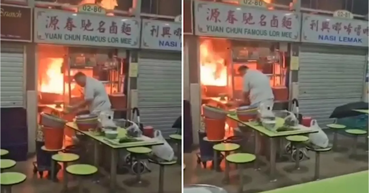 Uncle Calmly Gathers Bowls As Fire Engulfs His Hawker Stall In Singapore