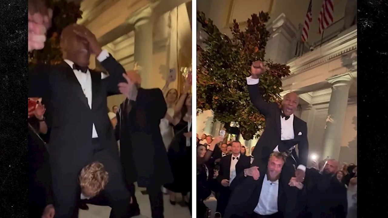 Jake Paul Puts Mike Tyson on Shoulders At Trump Party