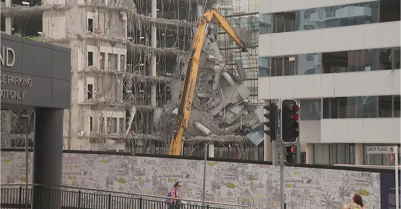 Worker Trapped in Excavator After Building Collapse at Demolition Site